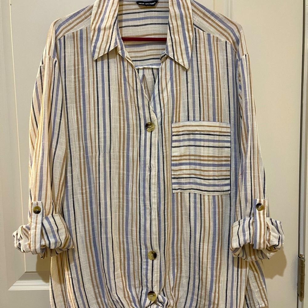 Unique Spectrum button up multi color shirt. 100% Cotton.